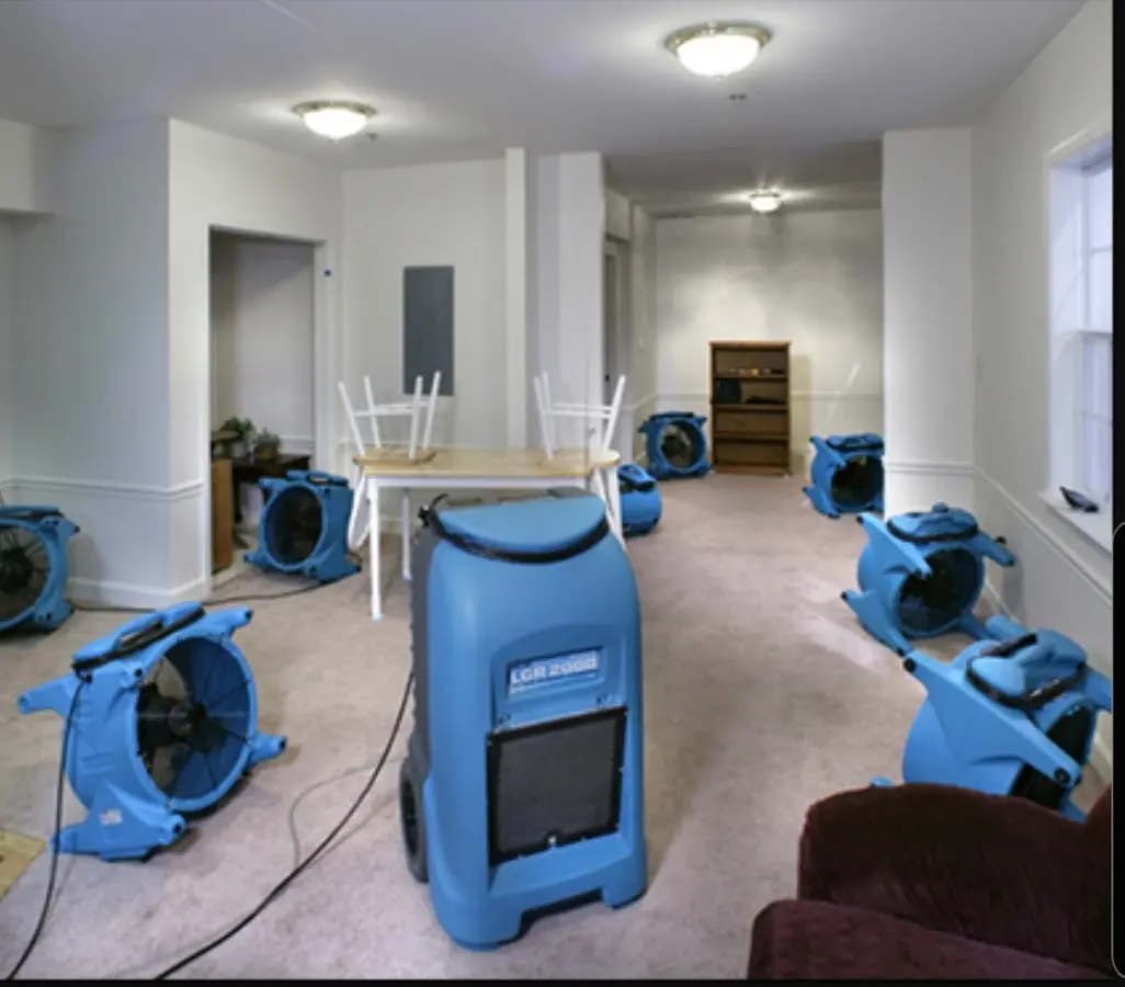Air movers and dehumidifier setup for Water Damage Restoration in Harpswell